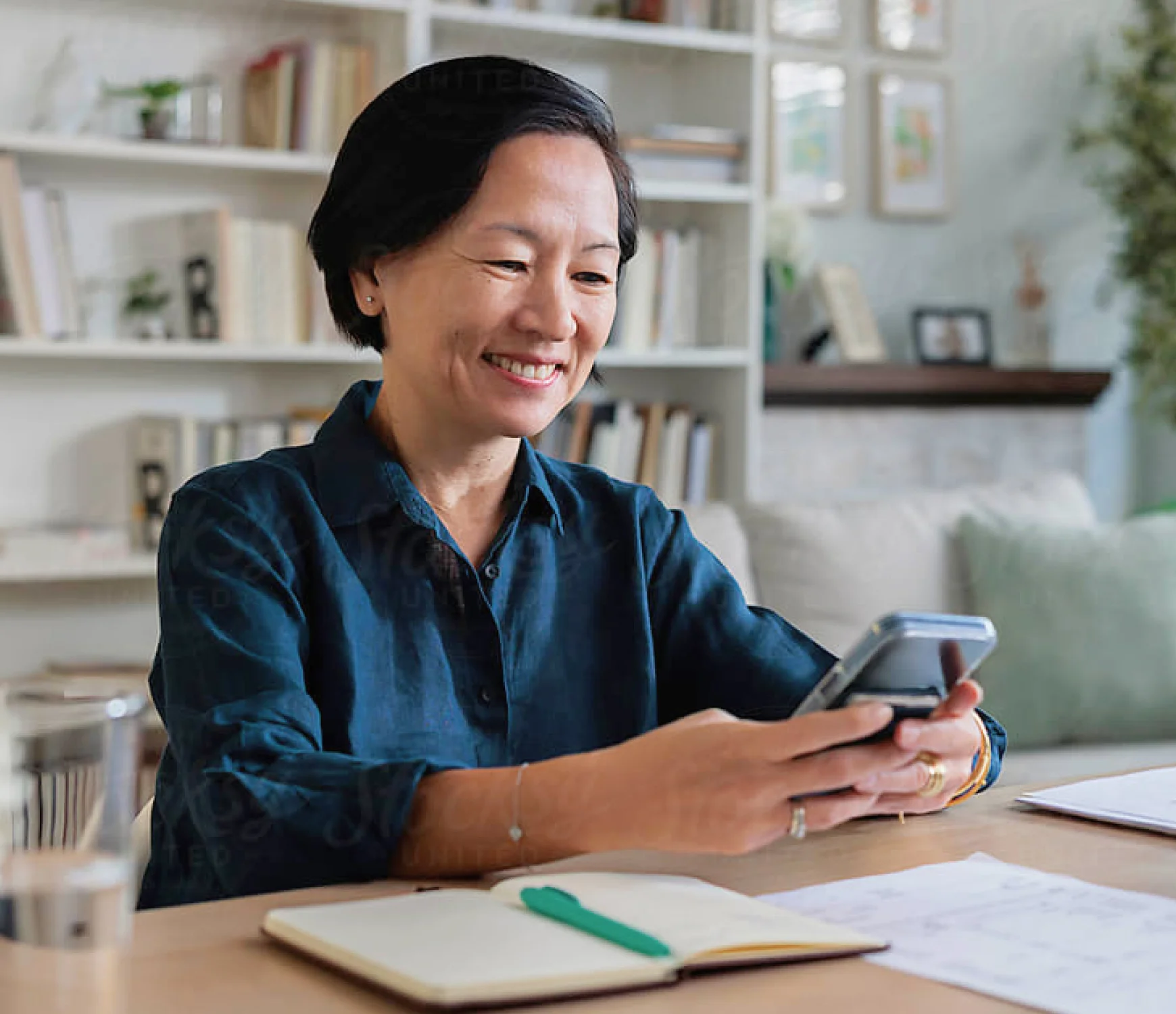 An investor reviewing information on a phone