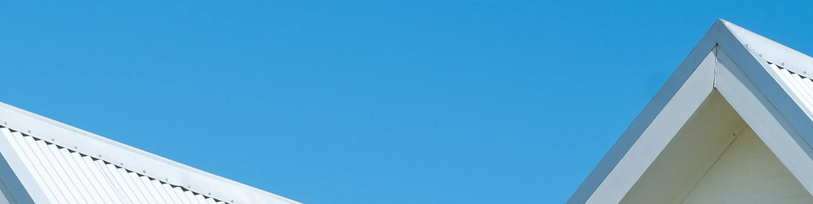 White roofs against a blue sky